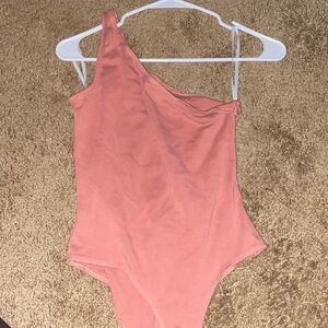 Pink body suit